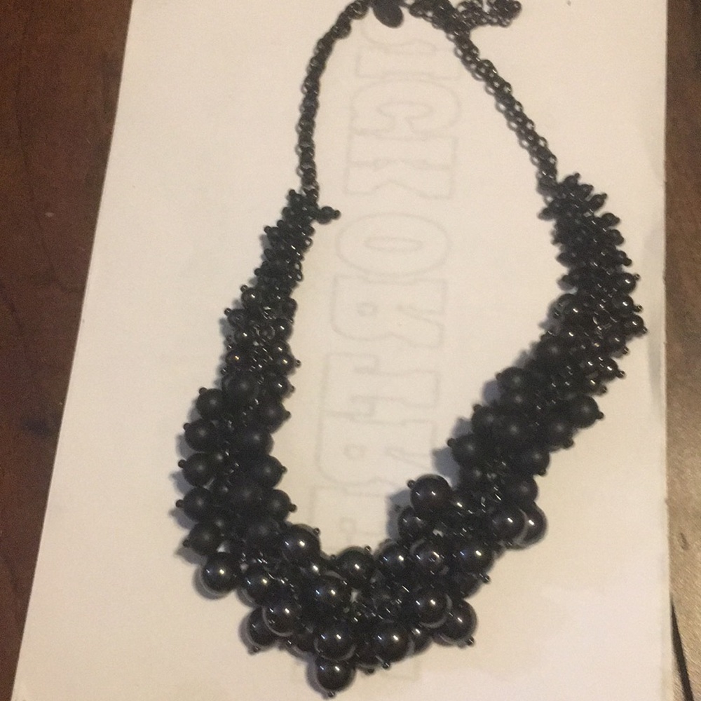 Choker style necklace with adjustable clasp